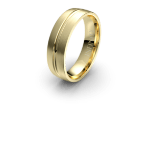 Gold wedding ring with engraved details.